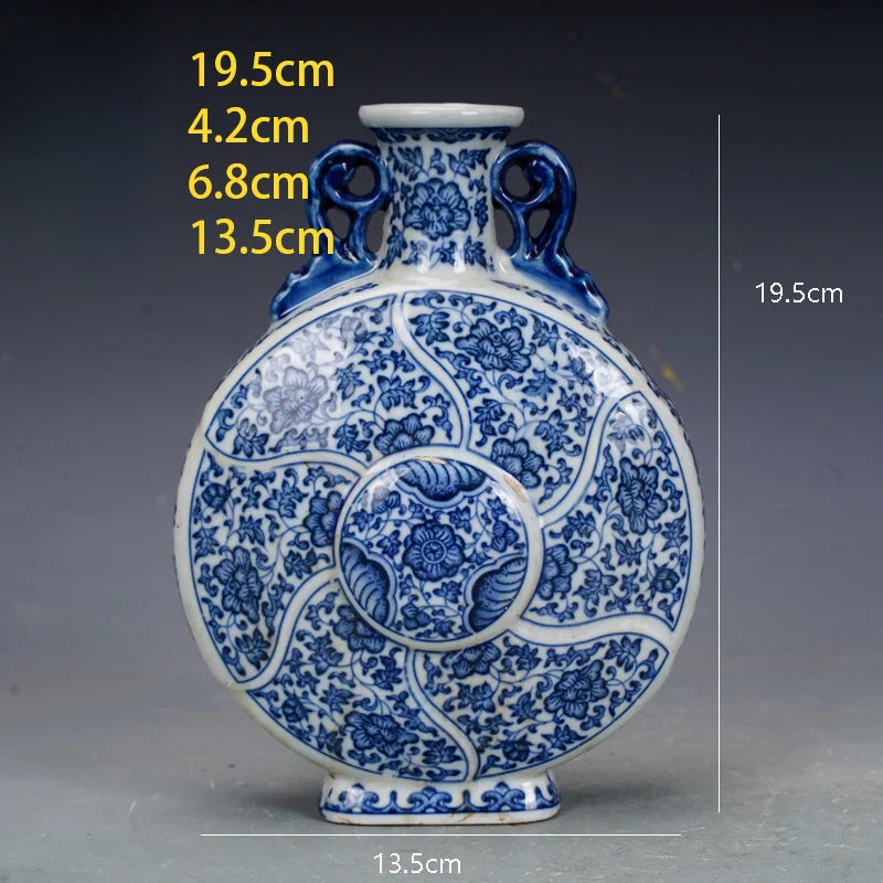 a blue and white vase is shown with measurements