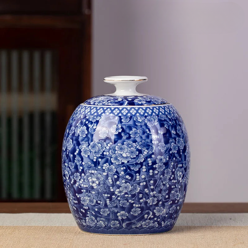 a blue and white vase sitting on a table