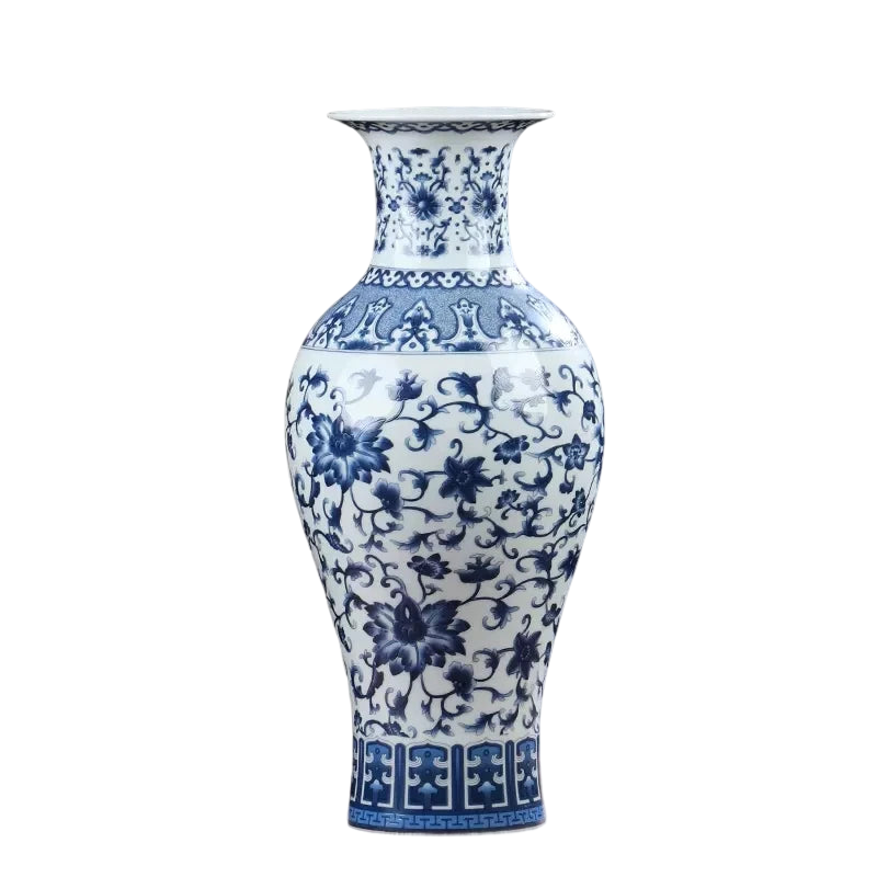 a blue and white vase sitting on top of a table