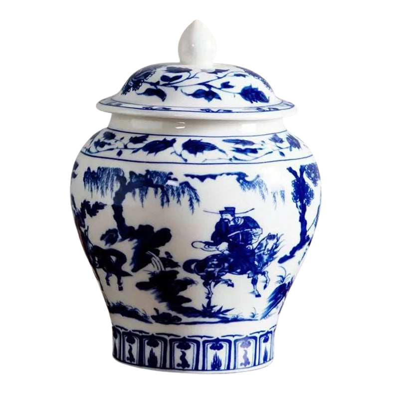 a blue and white jar with a lid