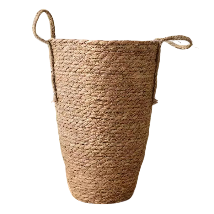 a large basket sitting on top of a wooden table