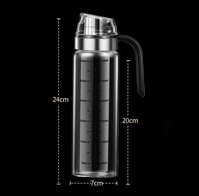 a glass water bottle with a handle and measurements