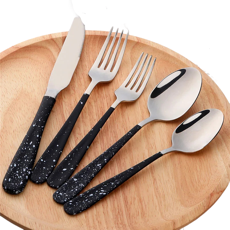 a set of five black and white utensils