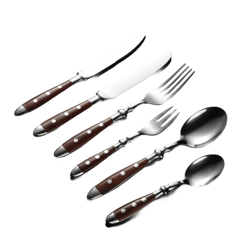 a set of knives, spoons, and knives on a black background