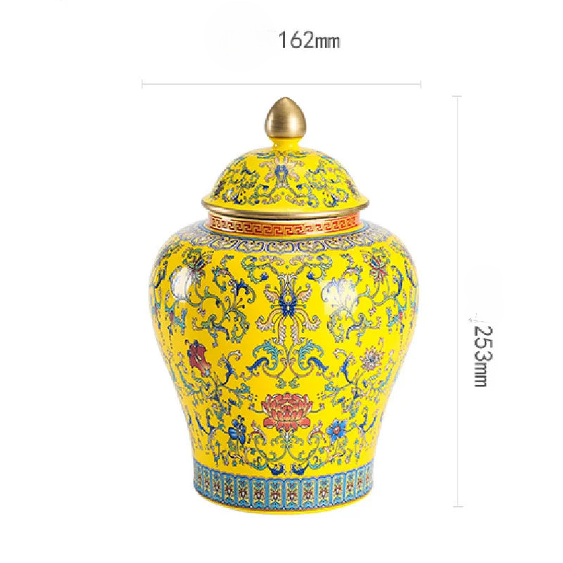 a yellow and blue vase with a lid