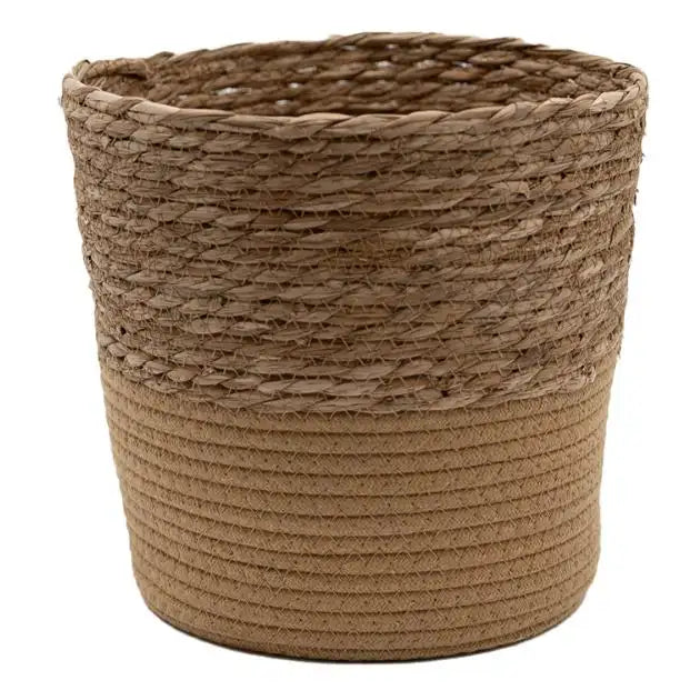 a brown basket with a rope handle on a white background