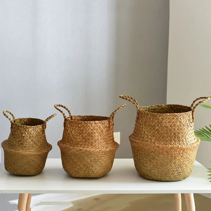 three woven baskets sitting on top of a table