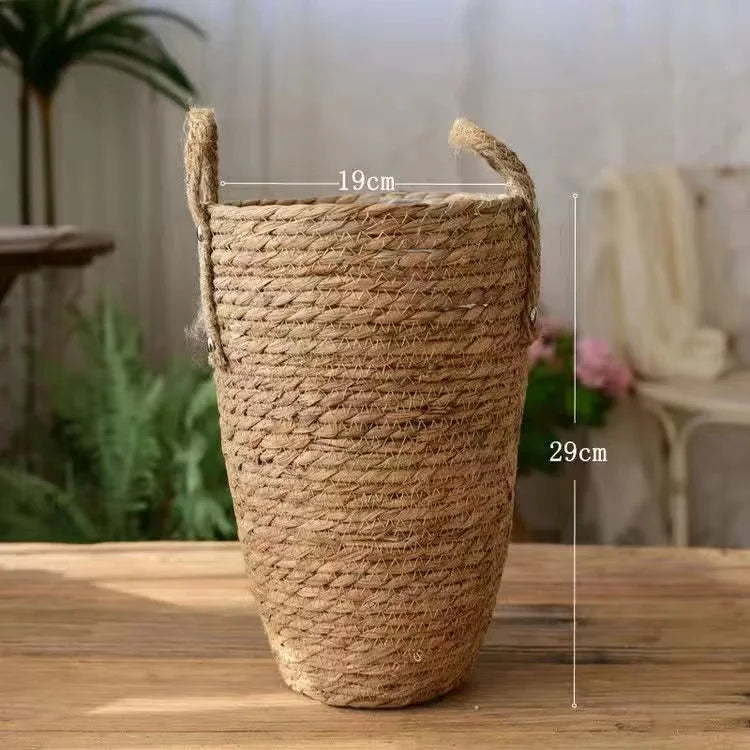 a large basket sitting on top of a wooden table