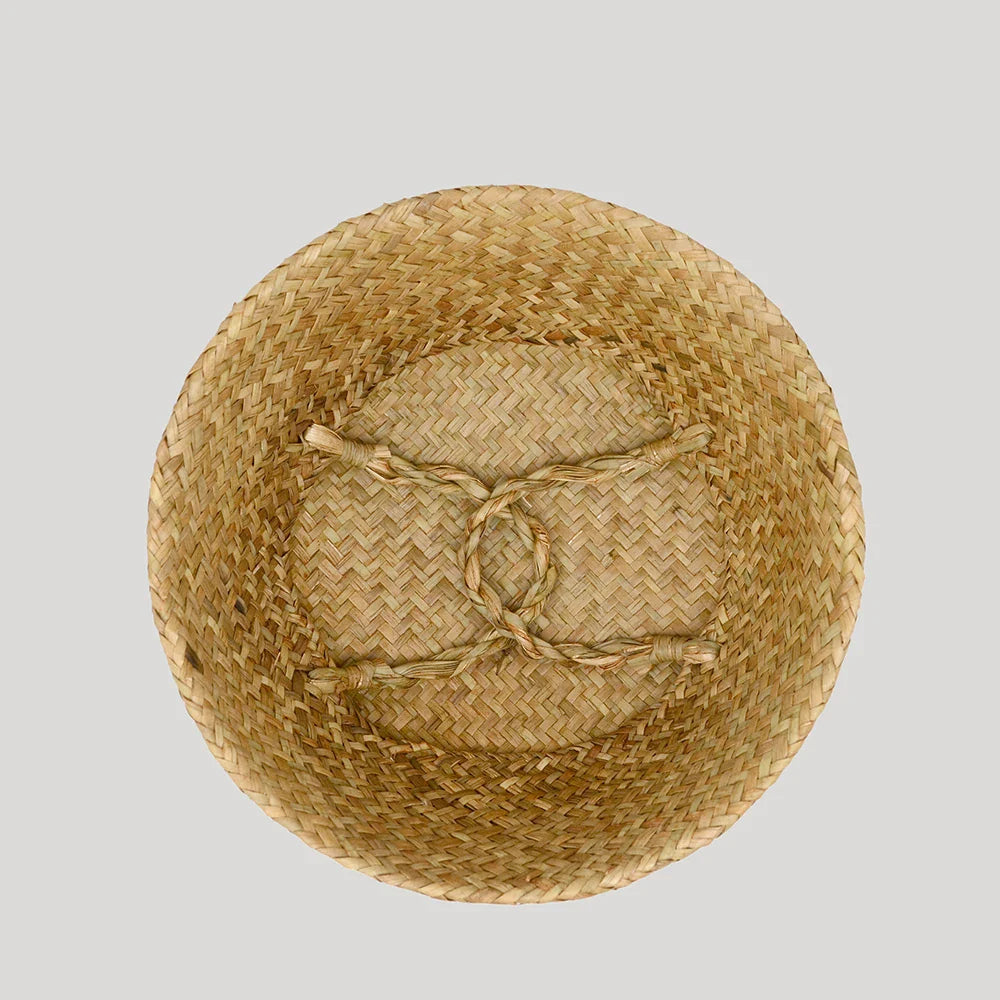 a woven basket with a knot in the middle