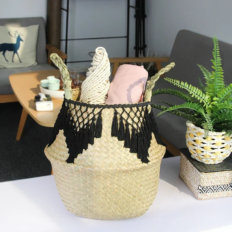 a living room with a couch and a table with a plant