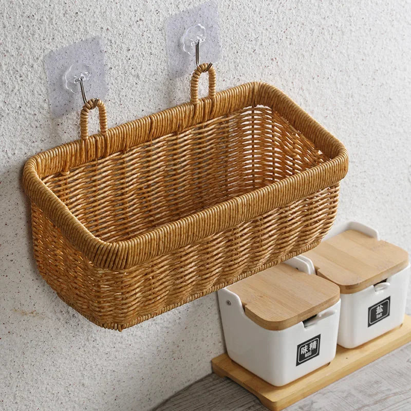 a wicker basket hanging on a wall next to two salt and pepper shakers