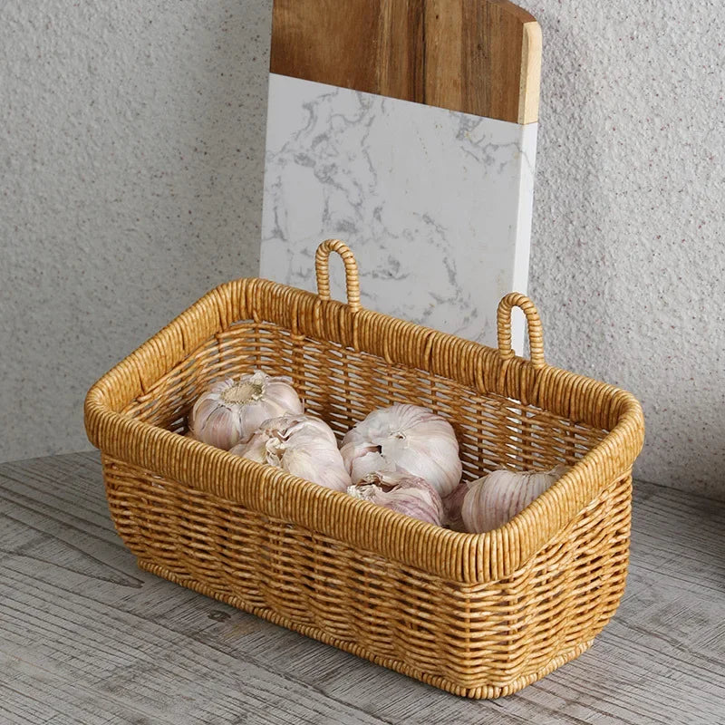 a basket of garlic sitting on top of a wooden table