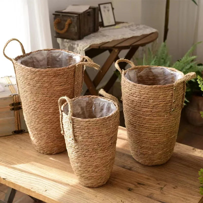 three baskets sitting on top of a wooden table