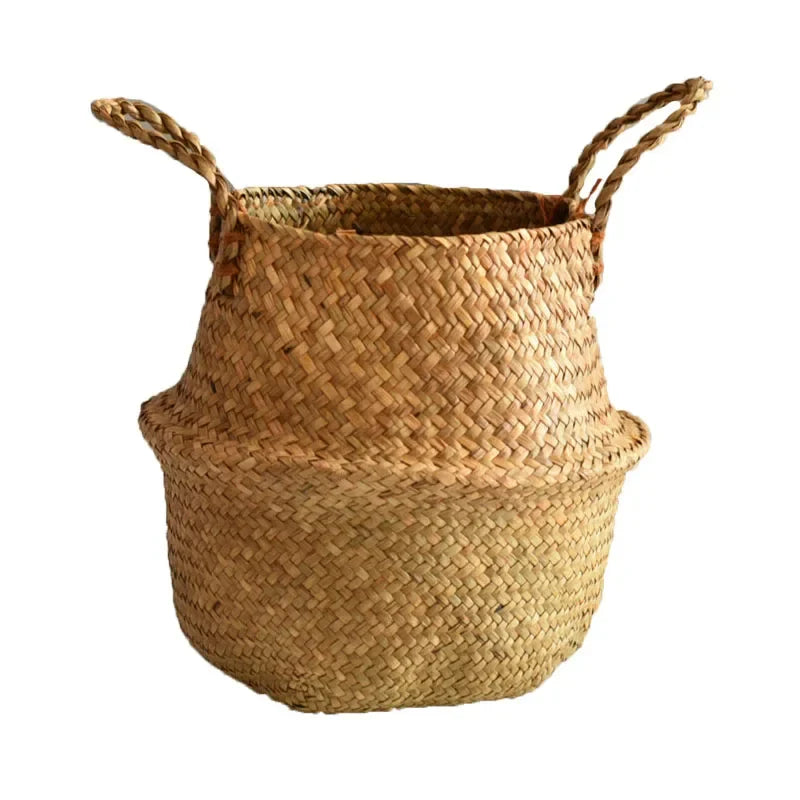 a woven basket with a handle on a white background