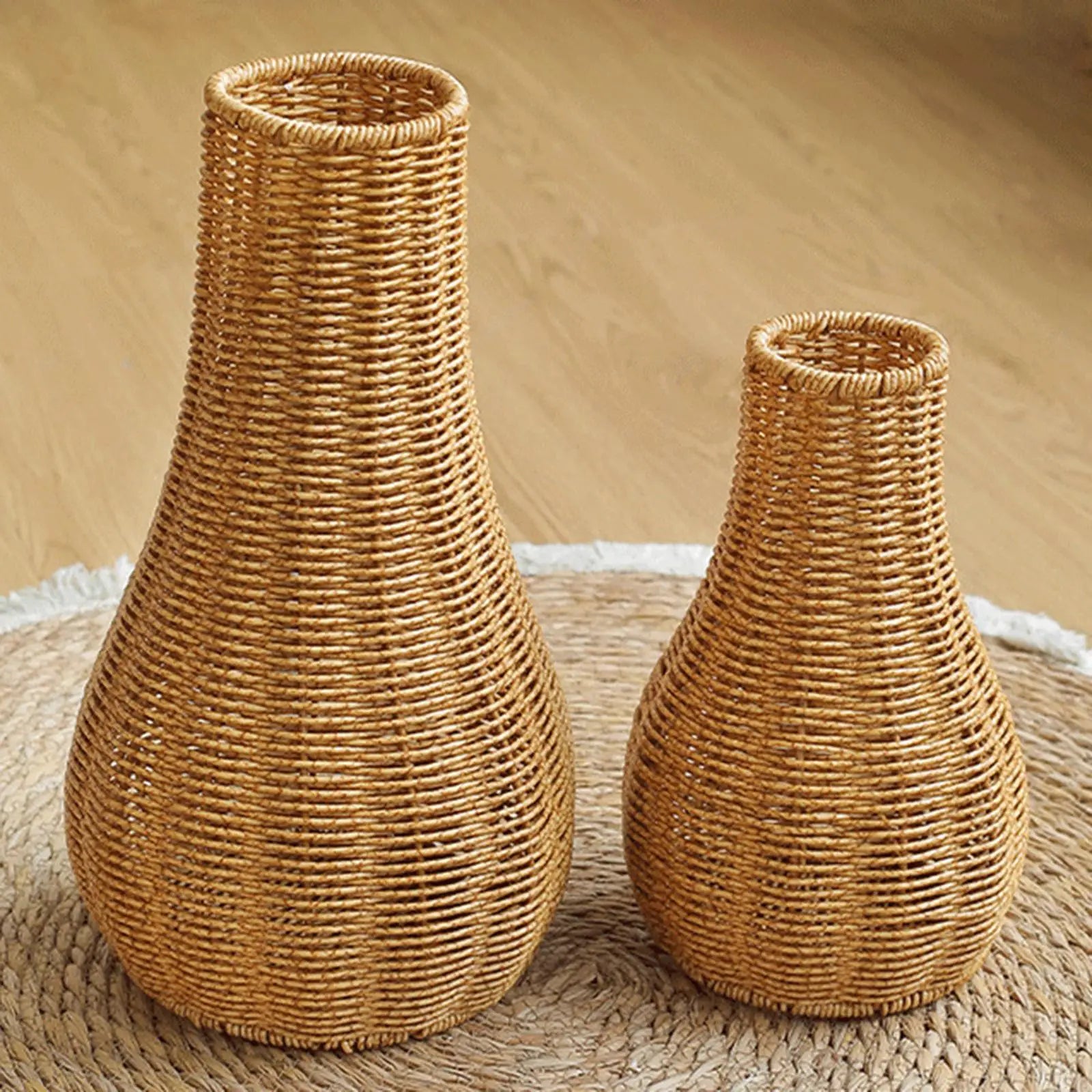 two wicker vases sitting on top of a rug