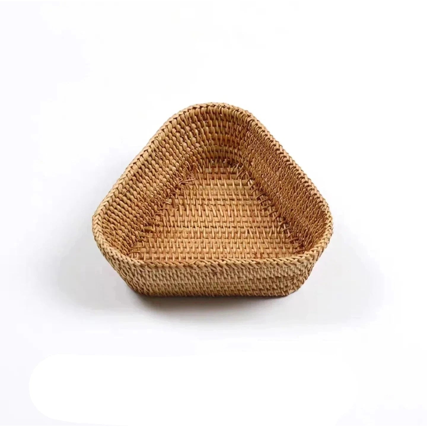 a woven basket is shown on a white background