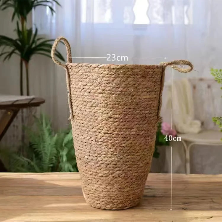 a large woven basket sitting on top of a wooden table