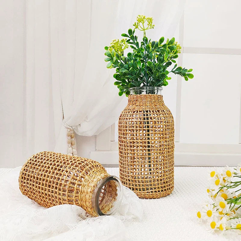 a couple of vases sitting on top of a table