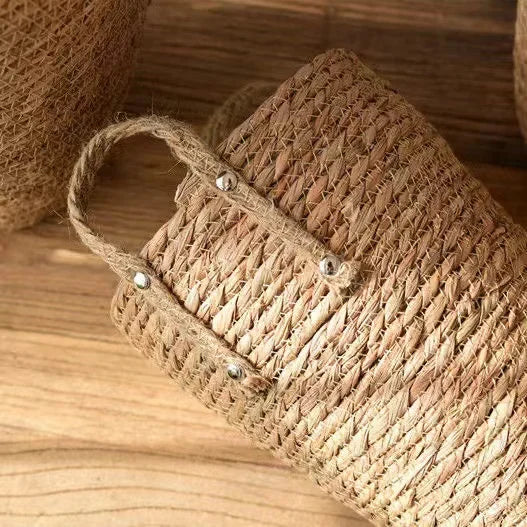 a close up of some jute bags on a wooden surface