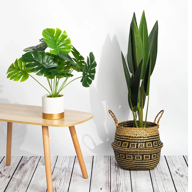 a plant in a basket next to a table