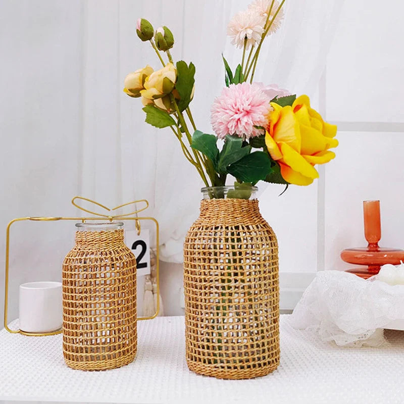 a couple of vases sitting on top of a table