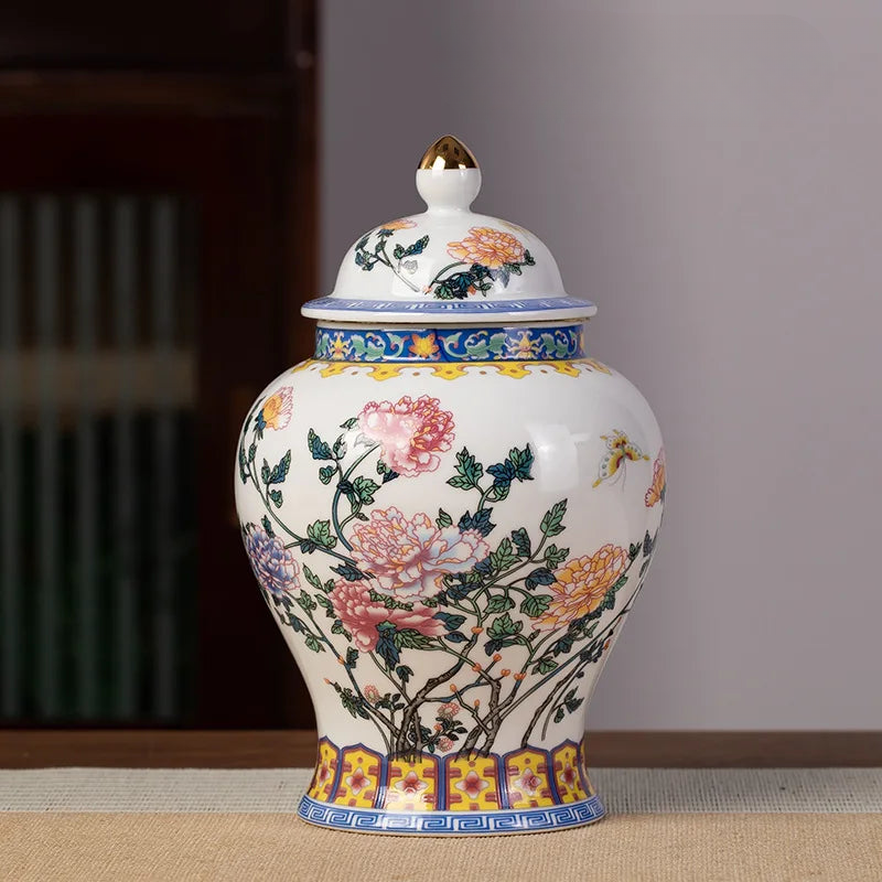 a white vase with flowers painted on it