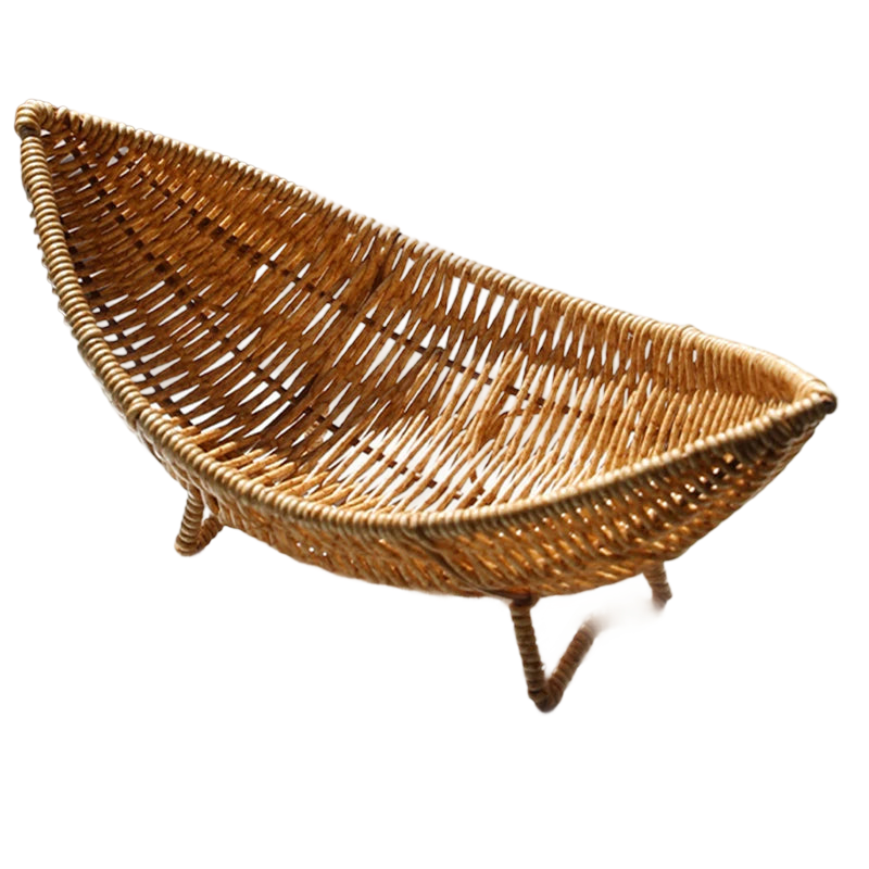 a wicker boat shaped like a boat on a black background